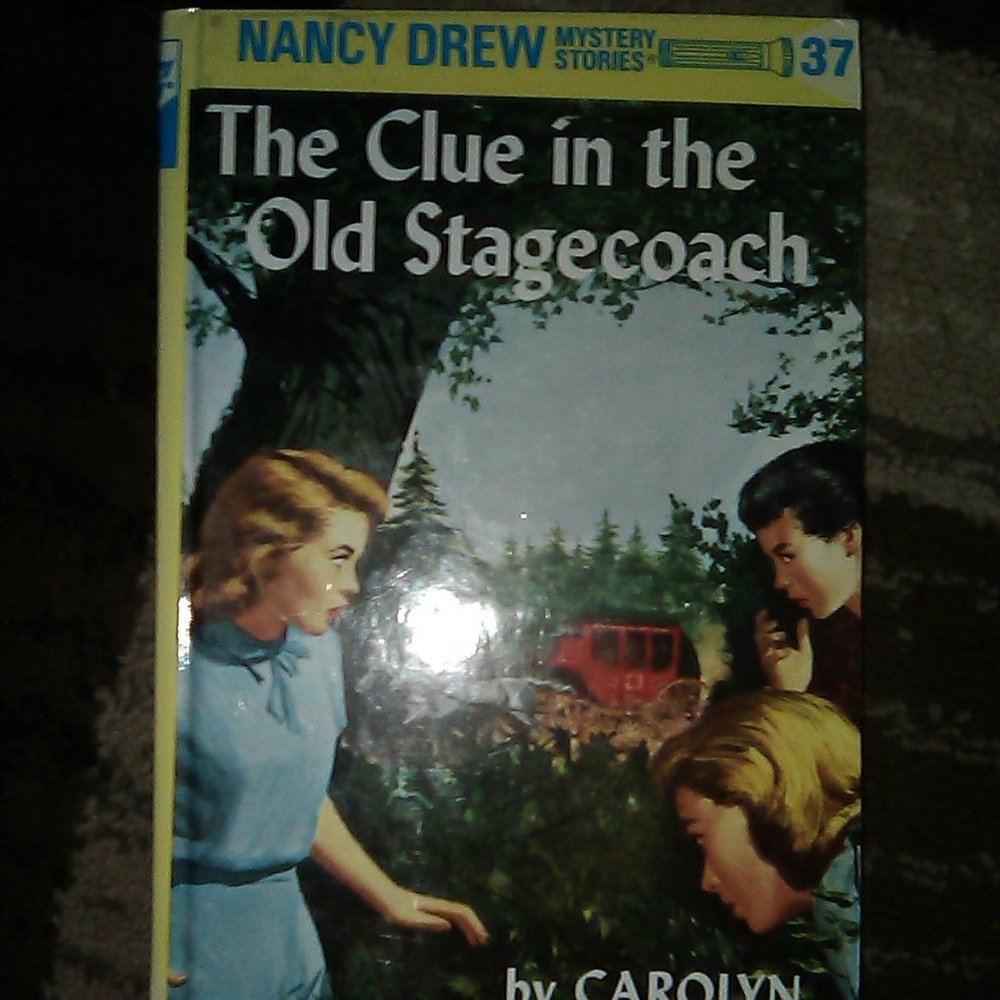 Yellow Hard-cover Nancy Drew Detective Series Book